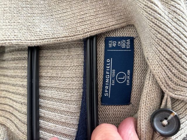 Jersey de punto beige y azul