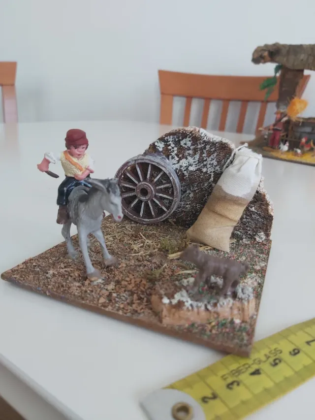 Figura Belén niño con burro y saco