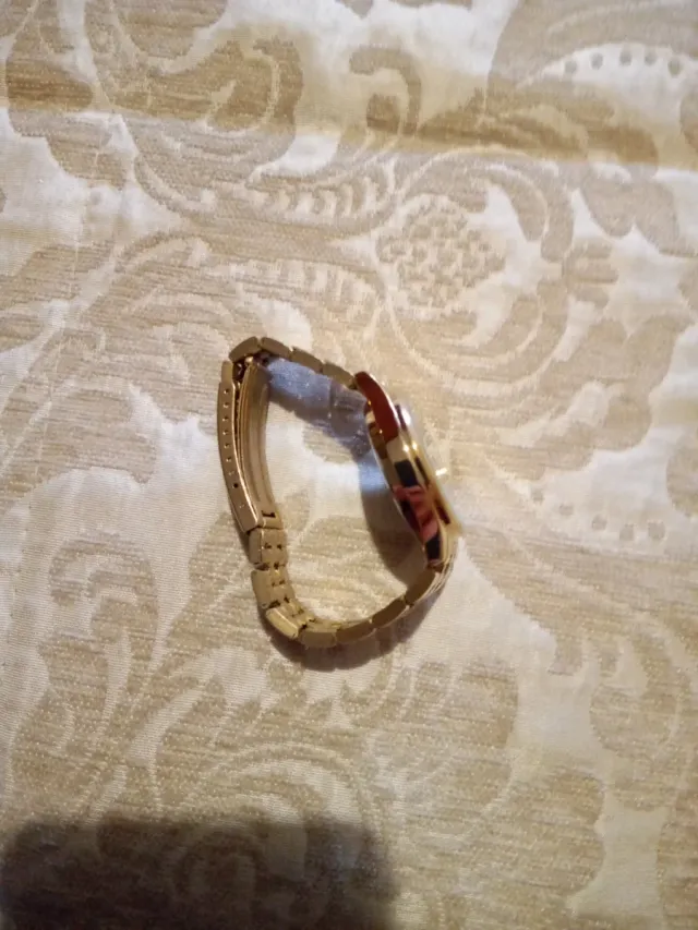 Reloj COLmar dorado y blanco