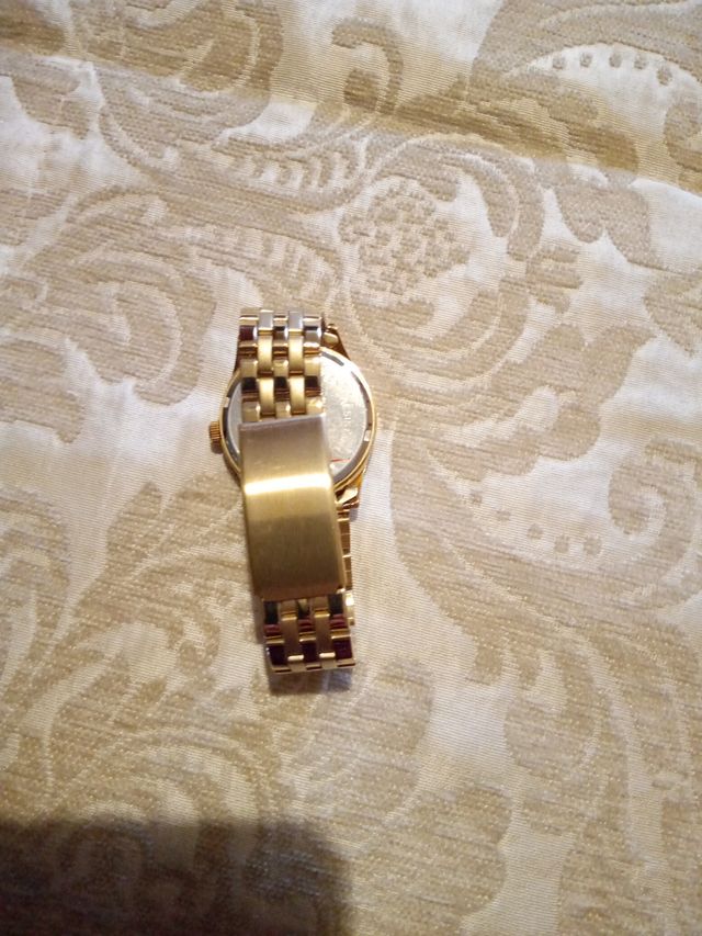 Reloj COLmar dorado y blanco