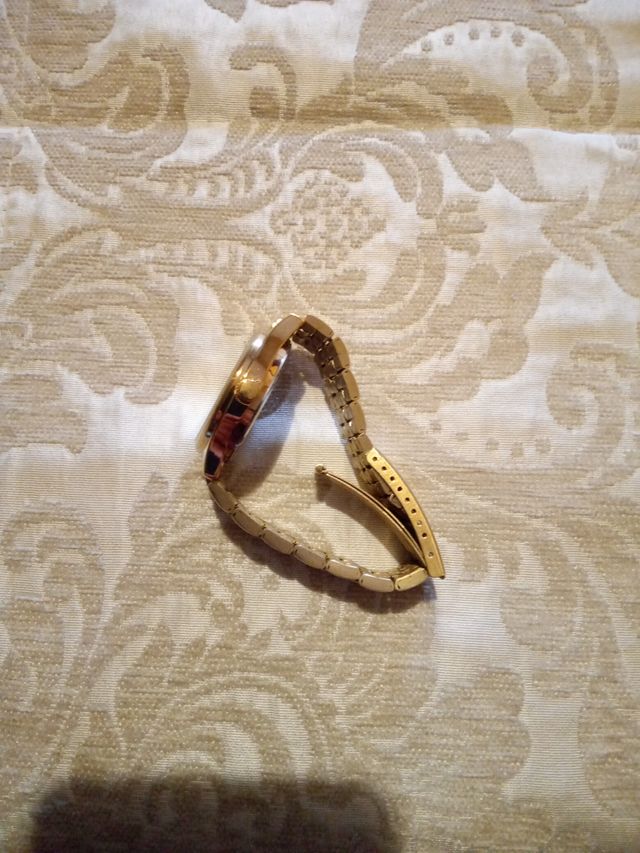 Reloj COLmar dorado y blanco