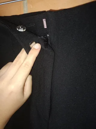 Pantalón negro de pinza.Tiro alto
