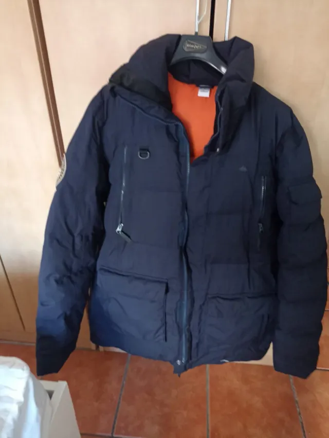 Chaqueta Quechua azul con forro naranja