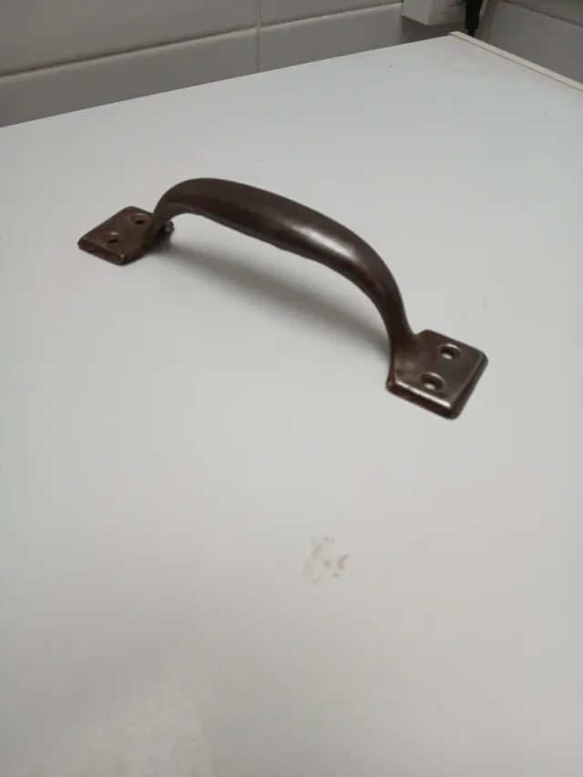 Asa antigua de metal