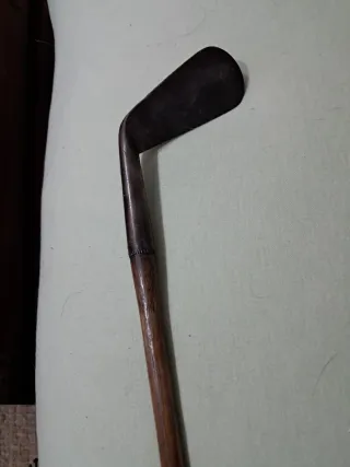 Palo de golf antiguo