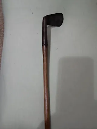 Palo de golf antiguo