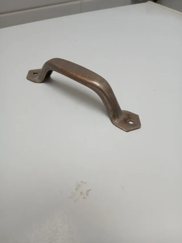 Asa antigua de metal