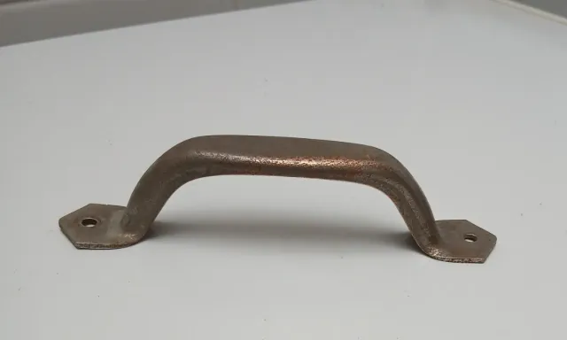 Asa antigua de metal