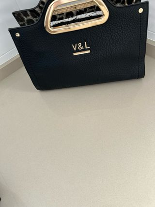 Bolso Victorio & Lucchino Negro y Dorado