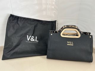 Bolso Victorio & Lucchino Negro y Dorado
