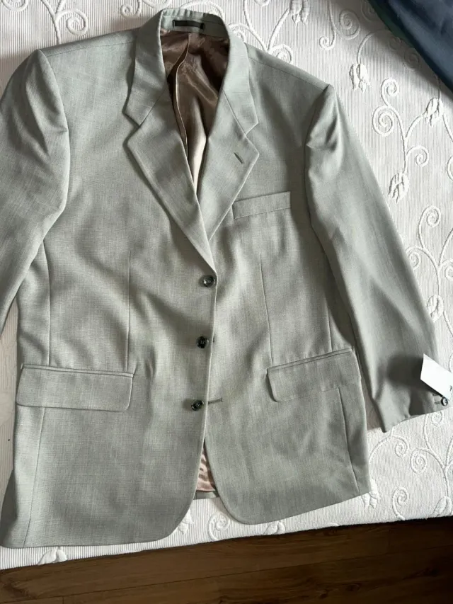 Chaqueta de traje verde/grisáceo. Sin estrenar