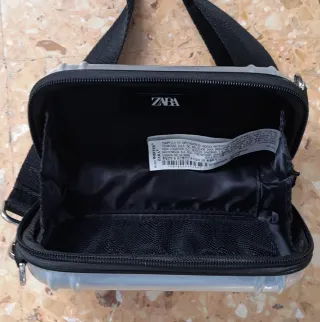 Bolso plateado Zara sin usar.