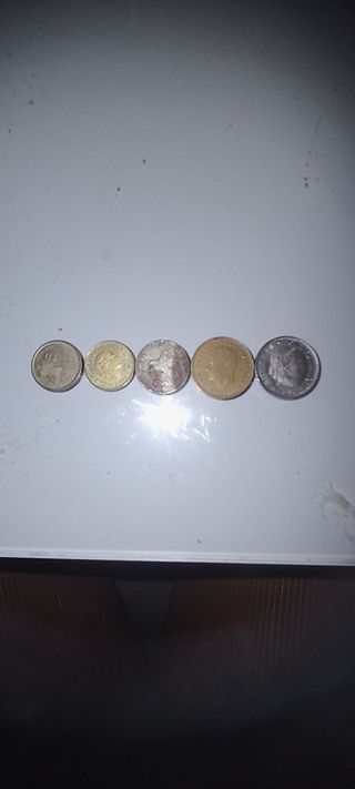 Varias monedas,pesetas, confederación heraldica