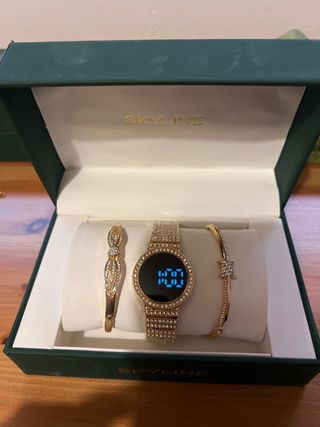 Reloj Skyline Dorado y Plateado