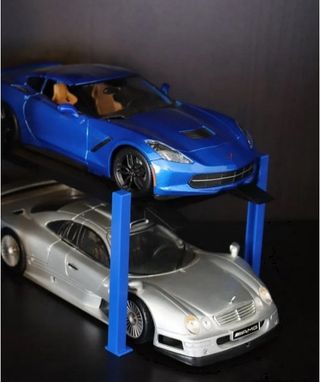 2 ELEVADORES O EXPOSITORES DE 2 COCHES ESCALA 1-18