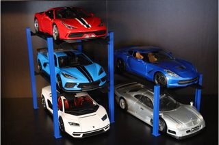 2 ELEVADORES O EXPOSITORES DE 2 COCHES ESCALA 1-18