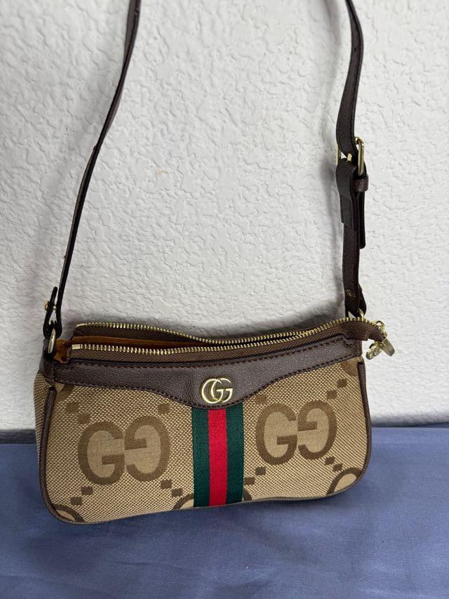 Bolso bandolera beige y marrón