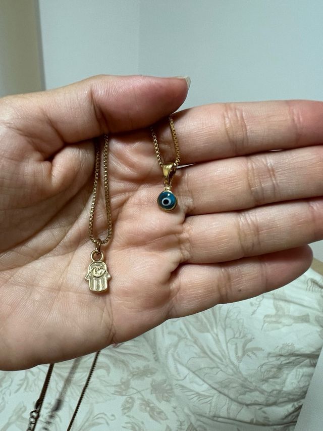 Confezione di 2 collane dorate con ciondoli