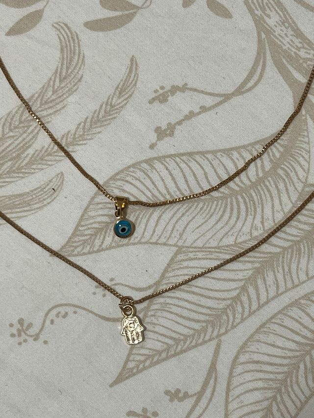 Confezione di 2 collane dorate con ciondoli