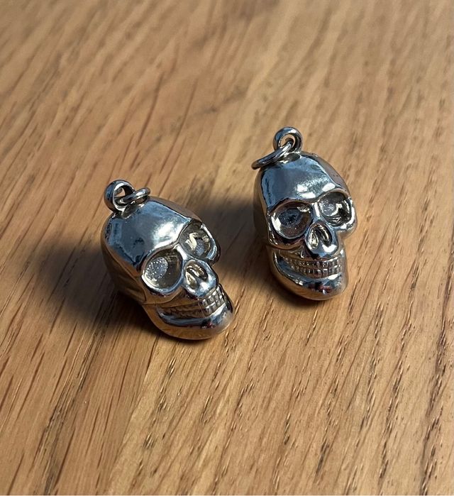 2 Colgantes Calavera Metal Plateado