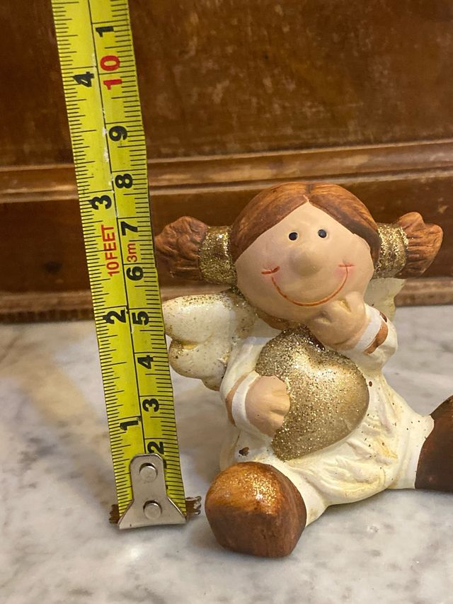 Angelo in terracotta con cuore glitterato