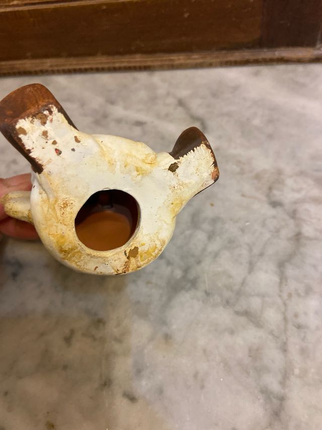 Angelo in terracotta con cuore glitterato