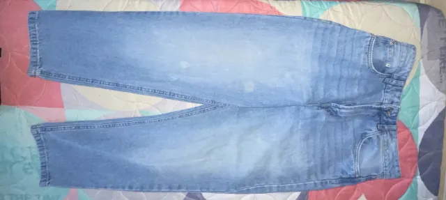 Pantalón tejano desgastado tiro medio