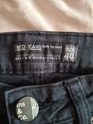 Pantalones negros vaqueros