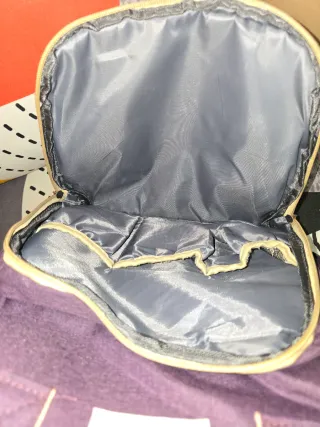 Mochila e muda fraldas roxa