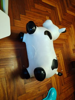 Juguete saltarín vaca