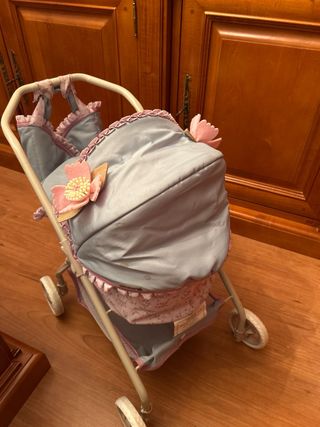 Carrito de muñecas verde y rosa