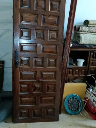 PRECIO UNITARIO. Puerta madera maciza.