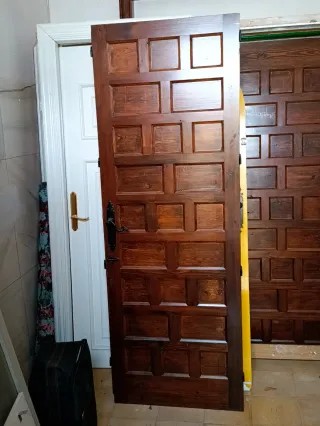 PRECIO UNITARIO. Puerta madera maciza.