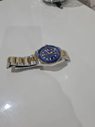 Reloj Rolex Azul y Dorado