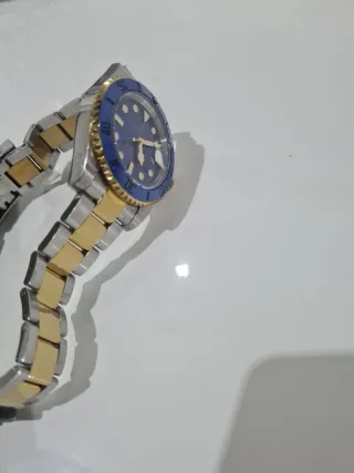 Reloj Rolex Azul y Dorado