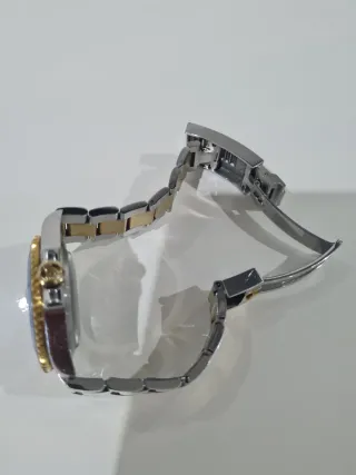 Reloj Rolex Azul y Dorado