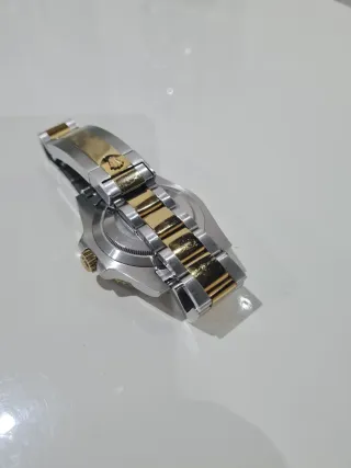 Reloj Rolex Azul y Dorado