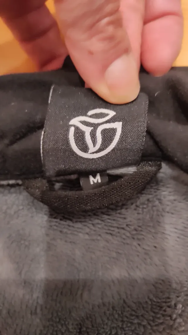 Cortavientos Ternua forrado negro/gris