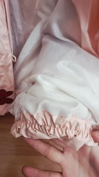 Plumas rosa kawaii con flores