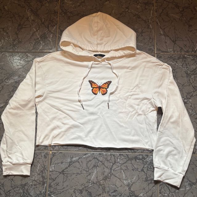 Sudadera blanca crop top mariposa