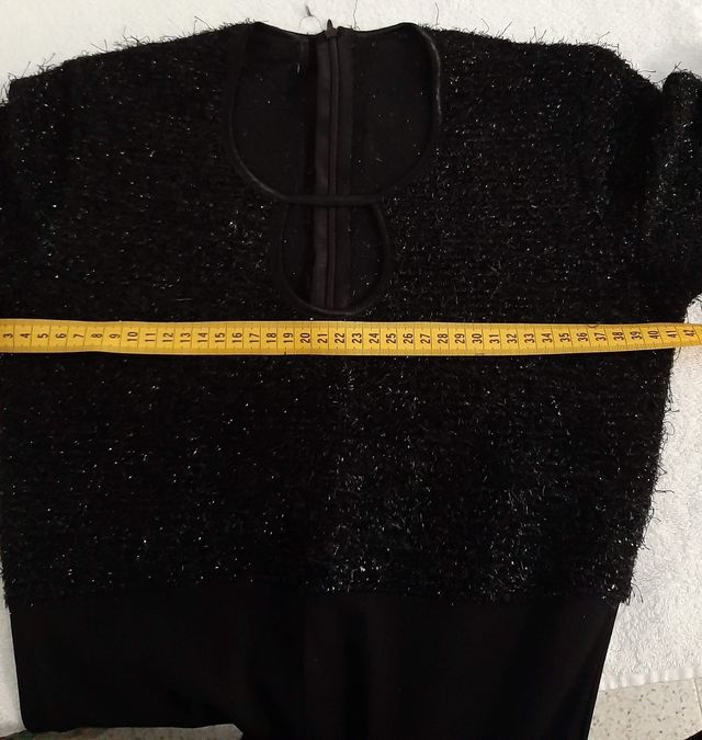 Mono negro con brillos