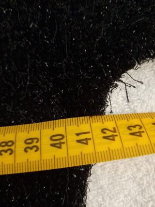 Mono negro con brillos