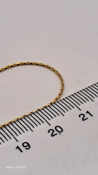 Colgante y cadena oro 18K con diamante