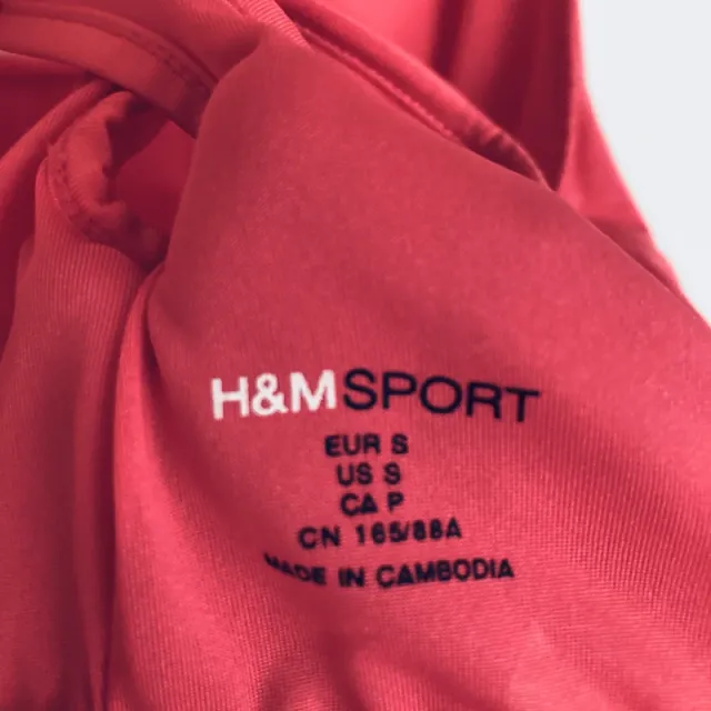 Camiseta deportiva H&M roja tirantes cruzados