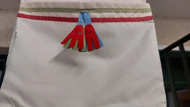 Porta todo infantil con 3 bolsillos