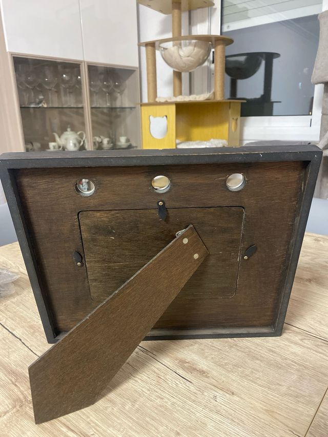 Cornice per foto in legno scuro