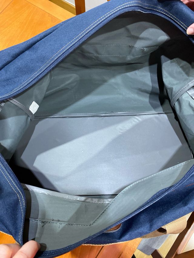 Bolsa de viaje azul y marrón