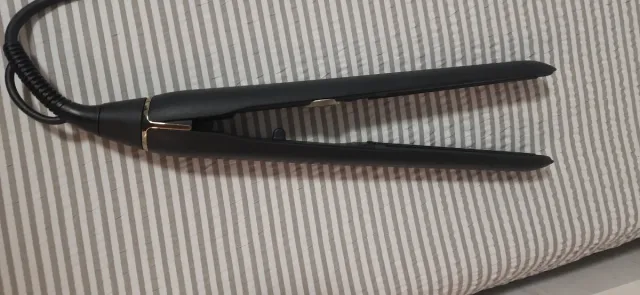 Plancha de pelo Philips negra y dorada