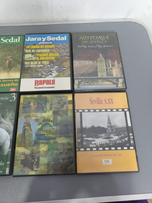 8 DVDs Documentales y Deportes