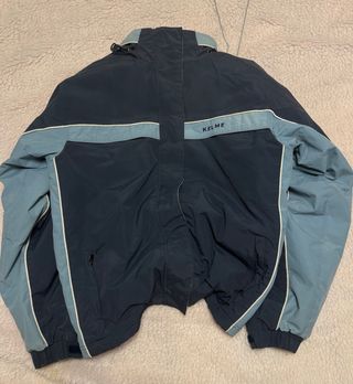Chaqueta abrigo Kelme azul y gris